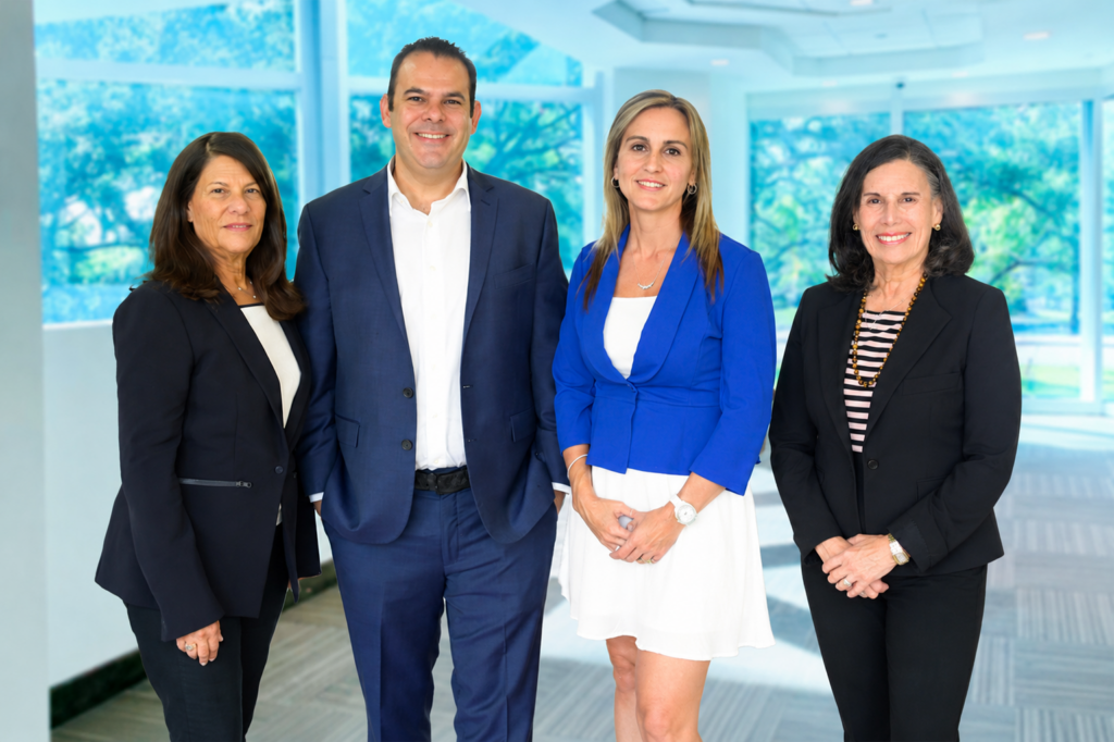 This image shoes Sara Adler, Jonathan Raiffe, Tina Spano, and Karen Adler - the CEO, VP/CFO and Principals of the company